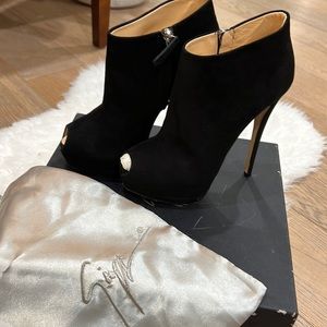 Giuseppe Zanotti black peep toe booties.